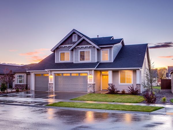 blue-and-gray-concrete-house-with-attic-during-twilight-186077